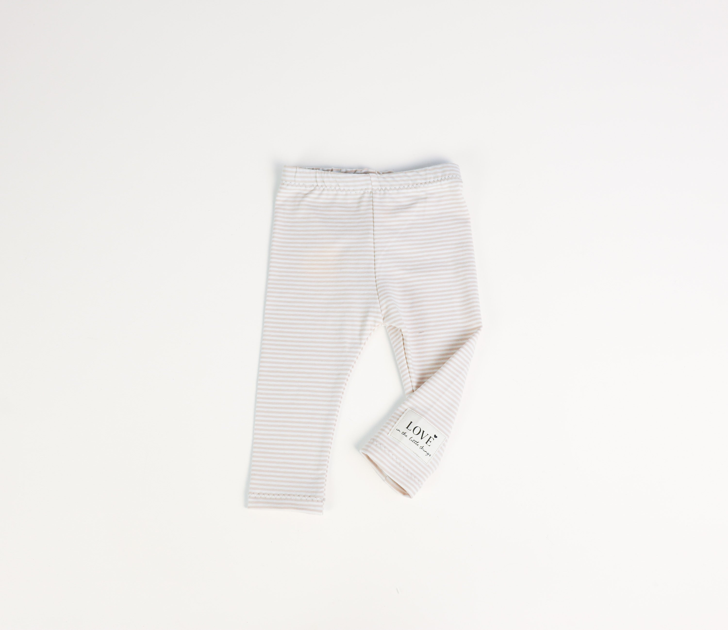 Gestreifte Baby Leggings in Beige und Weiß aus Baumwolljersey von VOODULU
