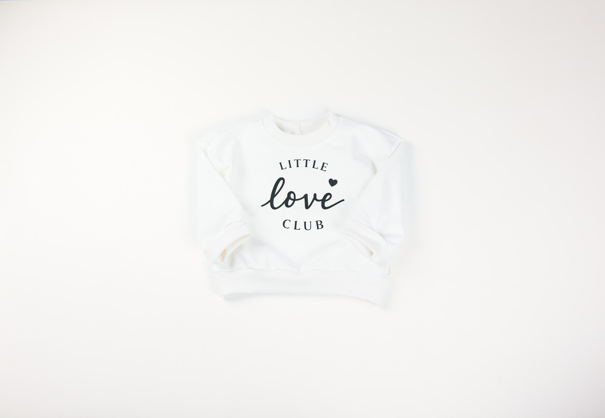 Mitwachsendes Baby Oversize Sweatshirt Ecru mit "little love Club" Print von VOODULU