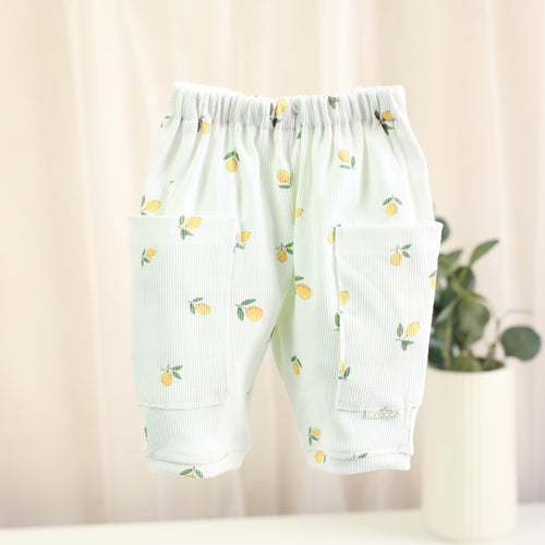 Weiße Barrel Hose aus Rib-Jersey mit Zitronenprint und Seitentaschen für Babys und Kinder