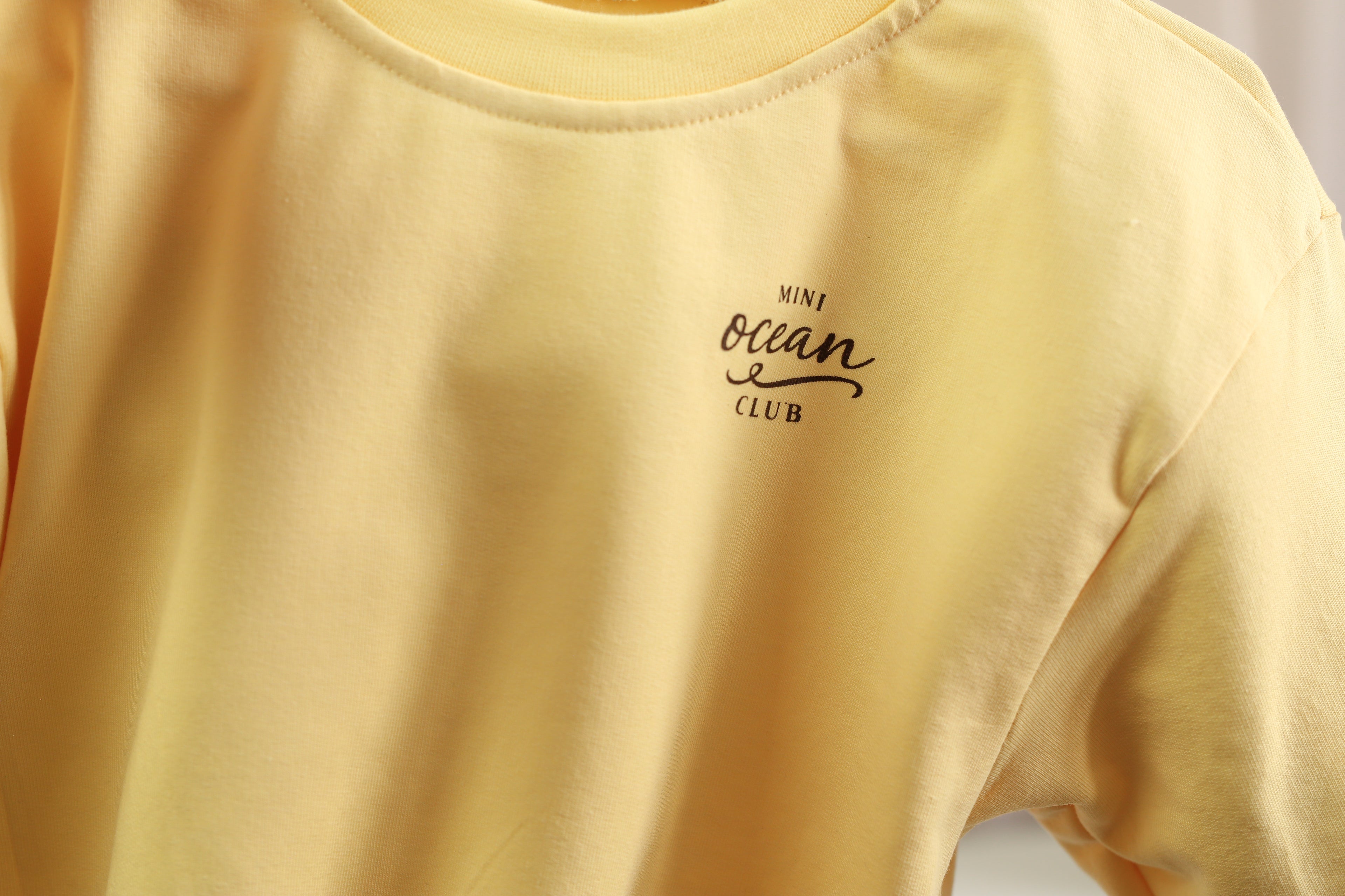 Oversize Pullover „Mini Ocean Club“ – Butter Yellow