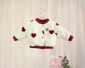 Baby Collegejacke in Ecru mit roten Herzen von VOODULU